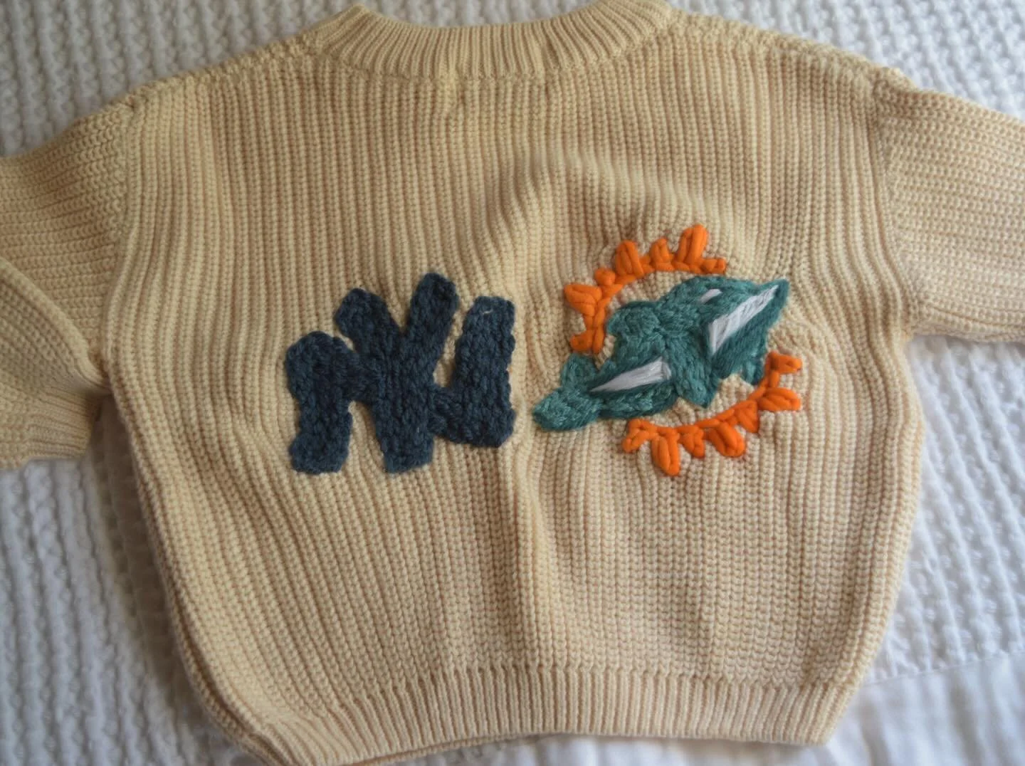 Multi team household? We got you. 🏈⚾️

Such a cute little sweater!! 

&bull;

&bull;

&bull;

&bull;
*we don&rsquo;t own the rights to this design