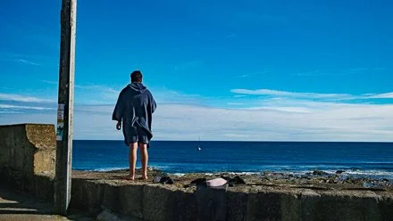 Porthleven Harbour Man on the Wall 1.jpg