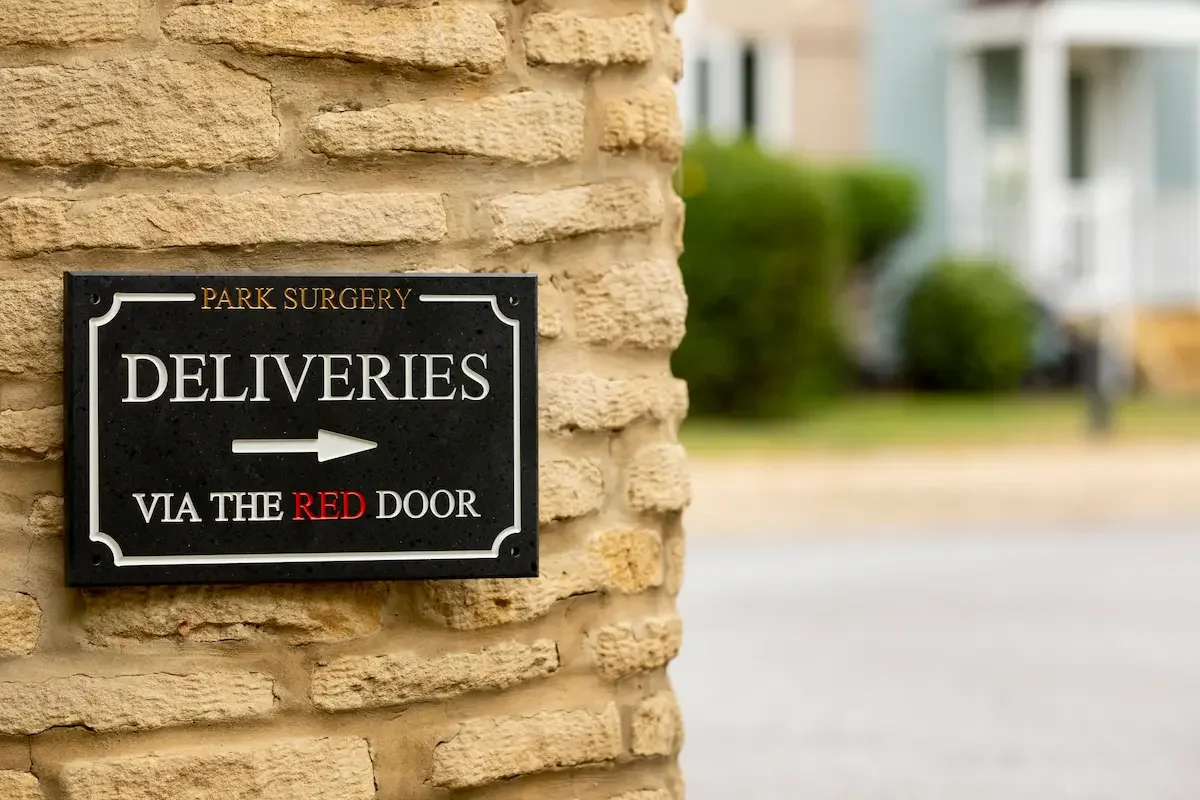 Stone Engraved Direction Sign in Charcoal