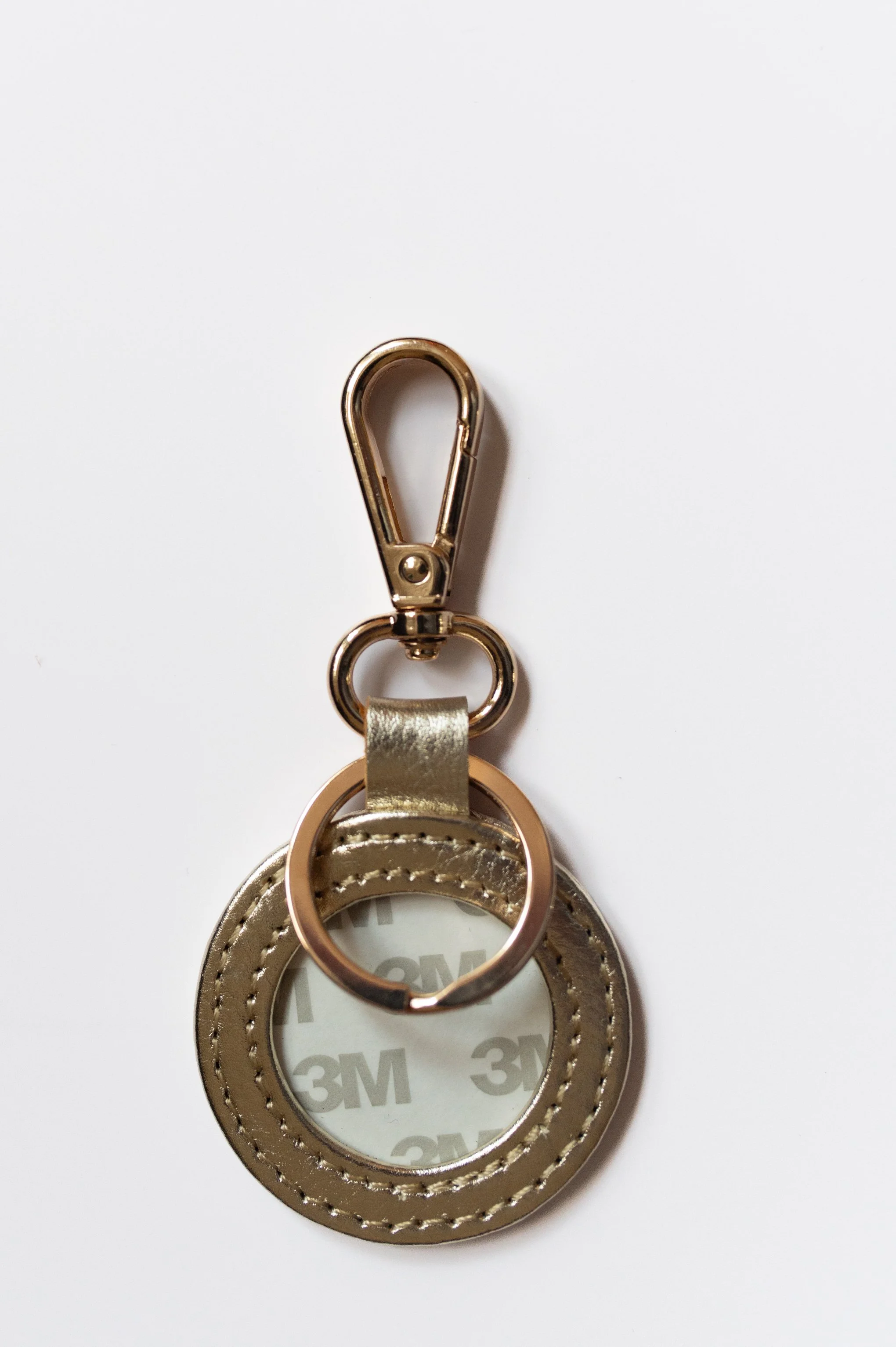 gold self-finishing key fob