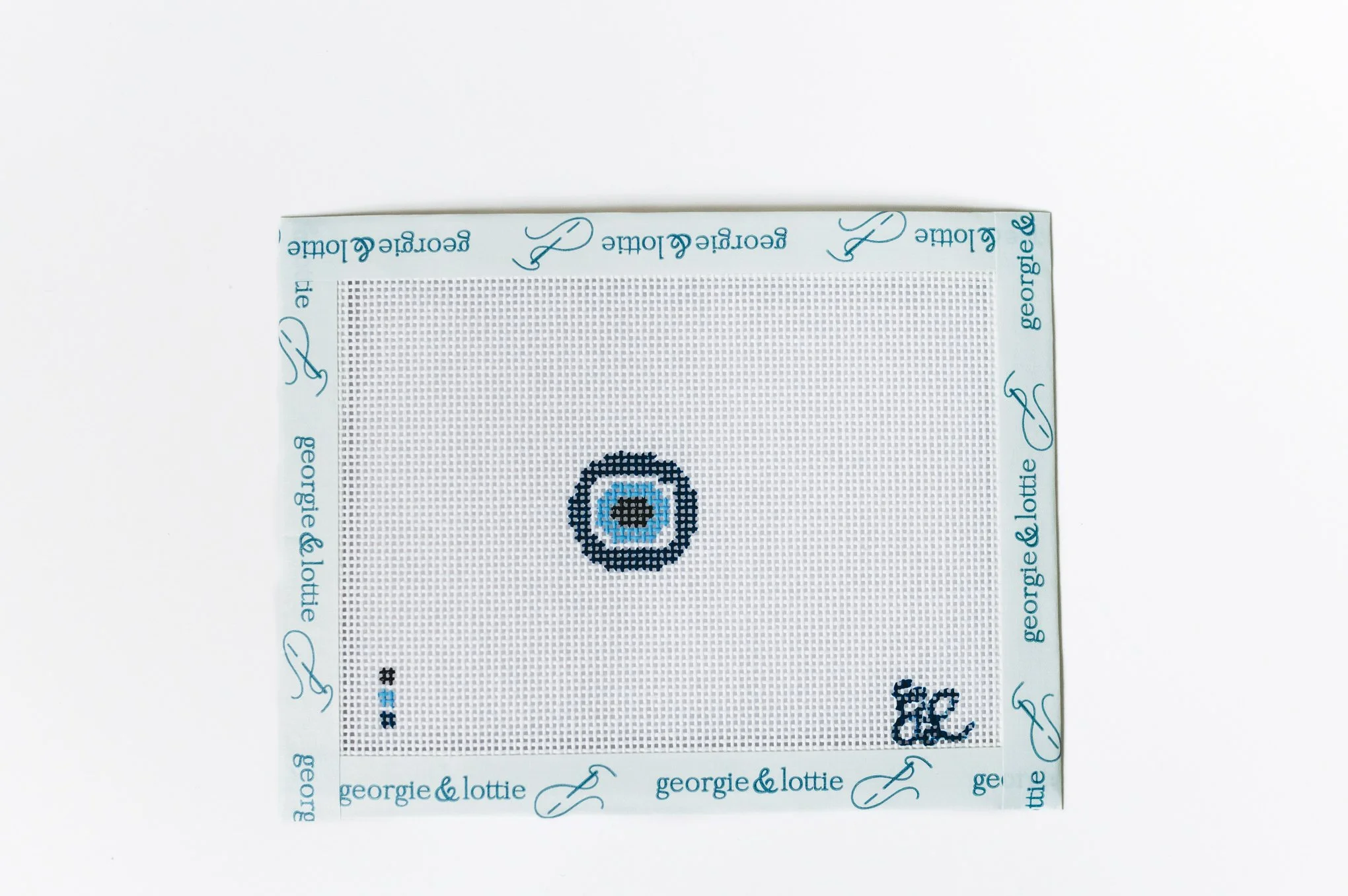 georgie-and-lottie-evil-eye-mini-bag-tag-canvas-02.jpg