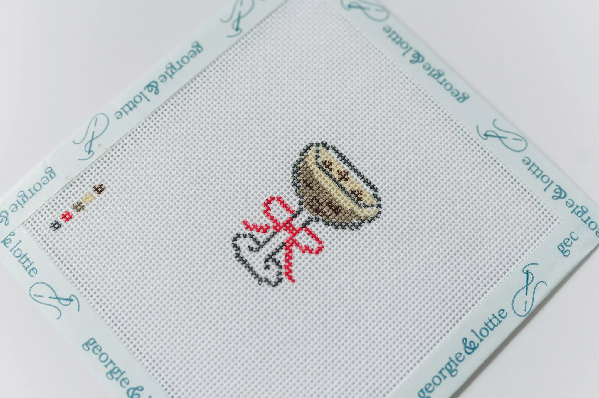 Georgie and Lottie espresso martini beginner needlepoint canvas.