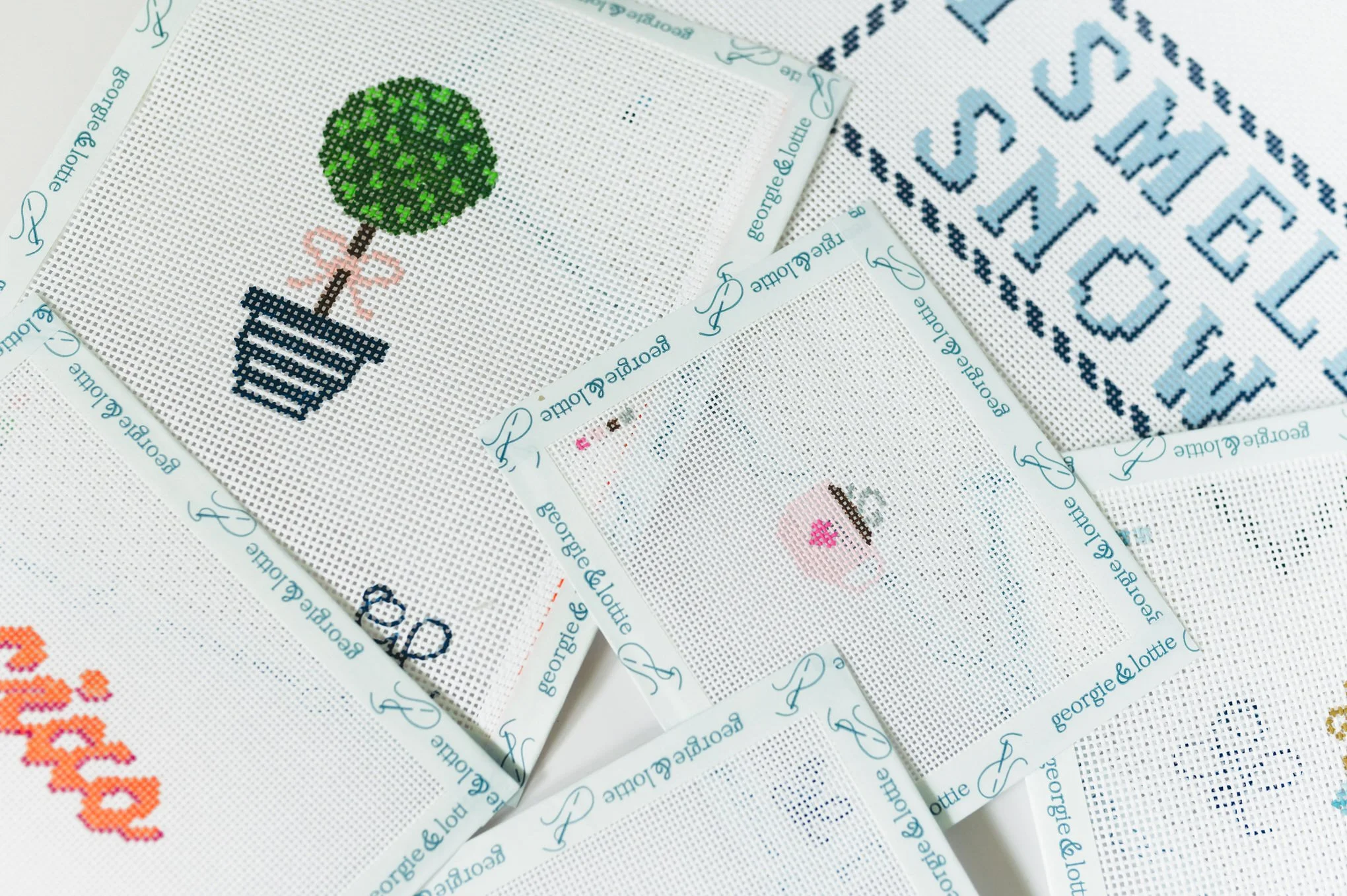 needlepoint canvases by Georgie and Lottie