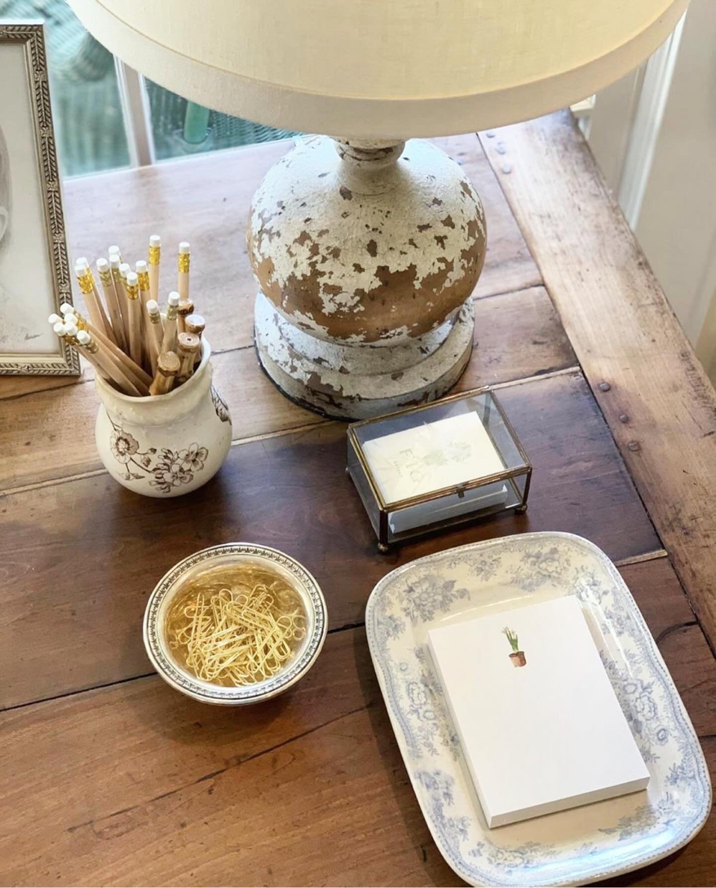 Styling your desk with the things you love makes even the smallest moments of the day feel intentional.

A beautiful notebook, a favorite pen, a small vintage vase for pencils, gold paper clips for a touch of cute, and a few meaningful objects can he