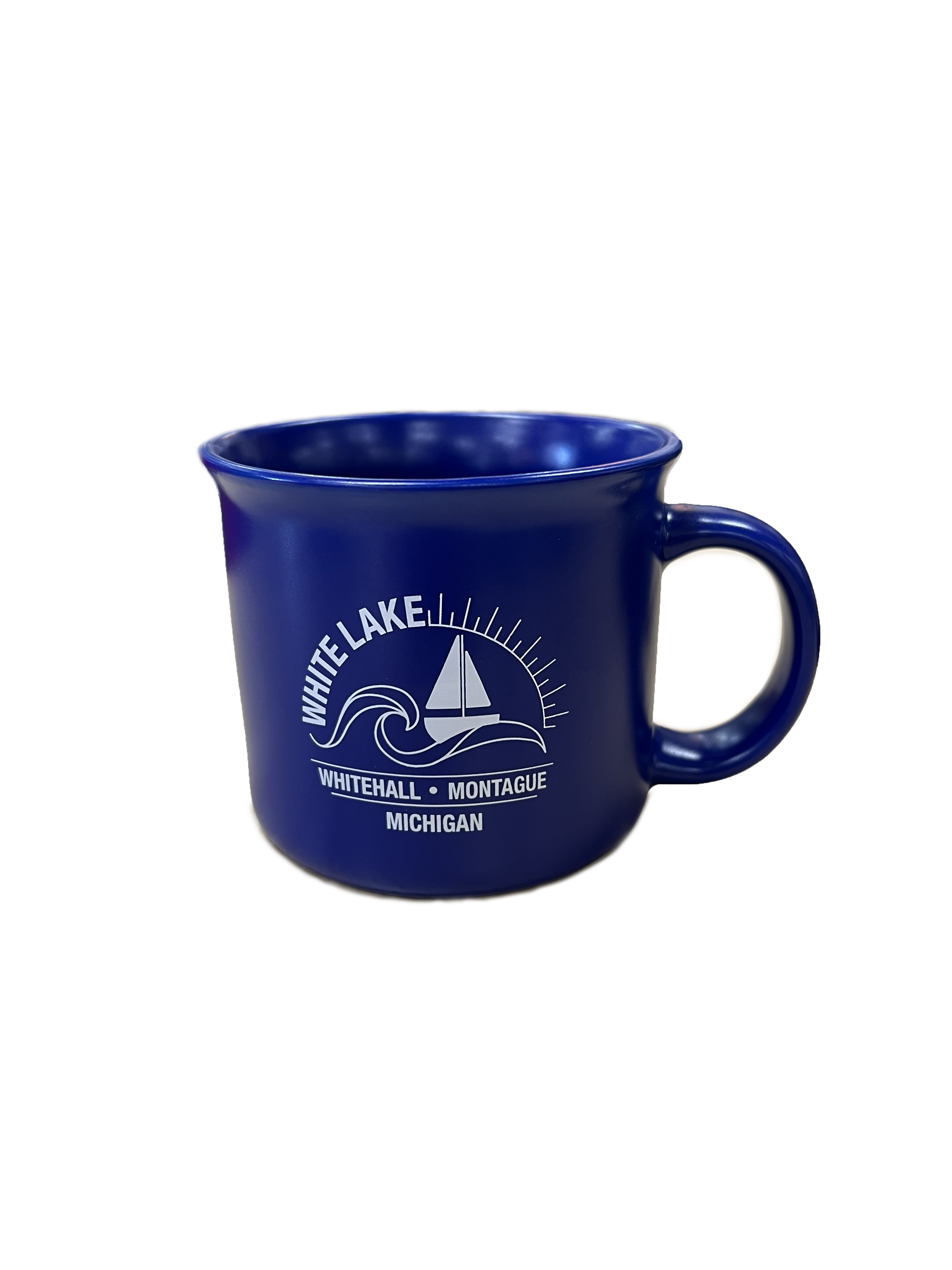 A blue ceramic mug with a white logo of White Lake, Michigan, featuring a sailboat, waves, and the text 'White Lake, Whitehall, Montague, Michigan' on the front.