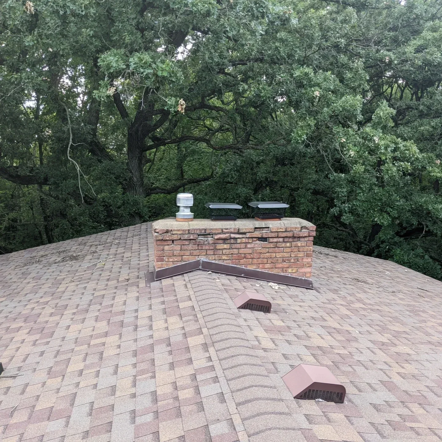 Smoke detector and carbon monoxide alarm installed in a St. Paul home with a fireplace to ensure safety.