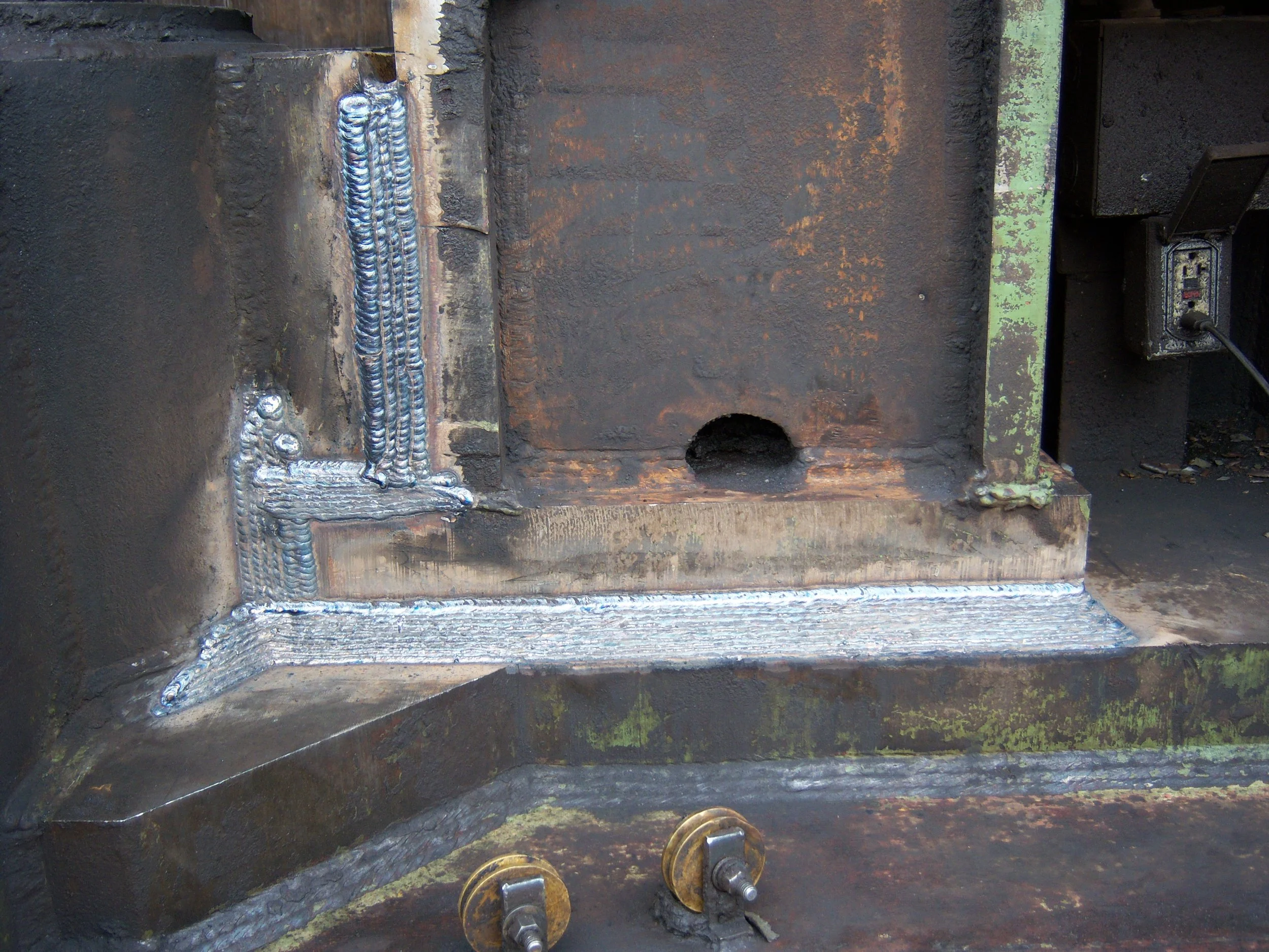 Heavy equipment shear repair with portable welding by RPW Contracting on 880-ton industrial machine in Jeannette, PA