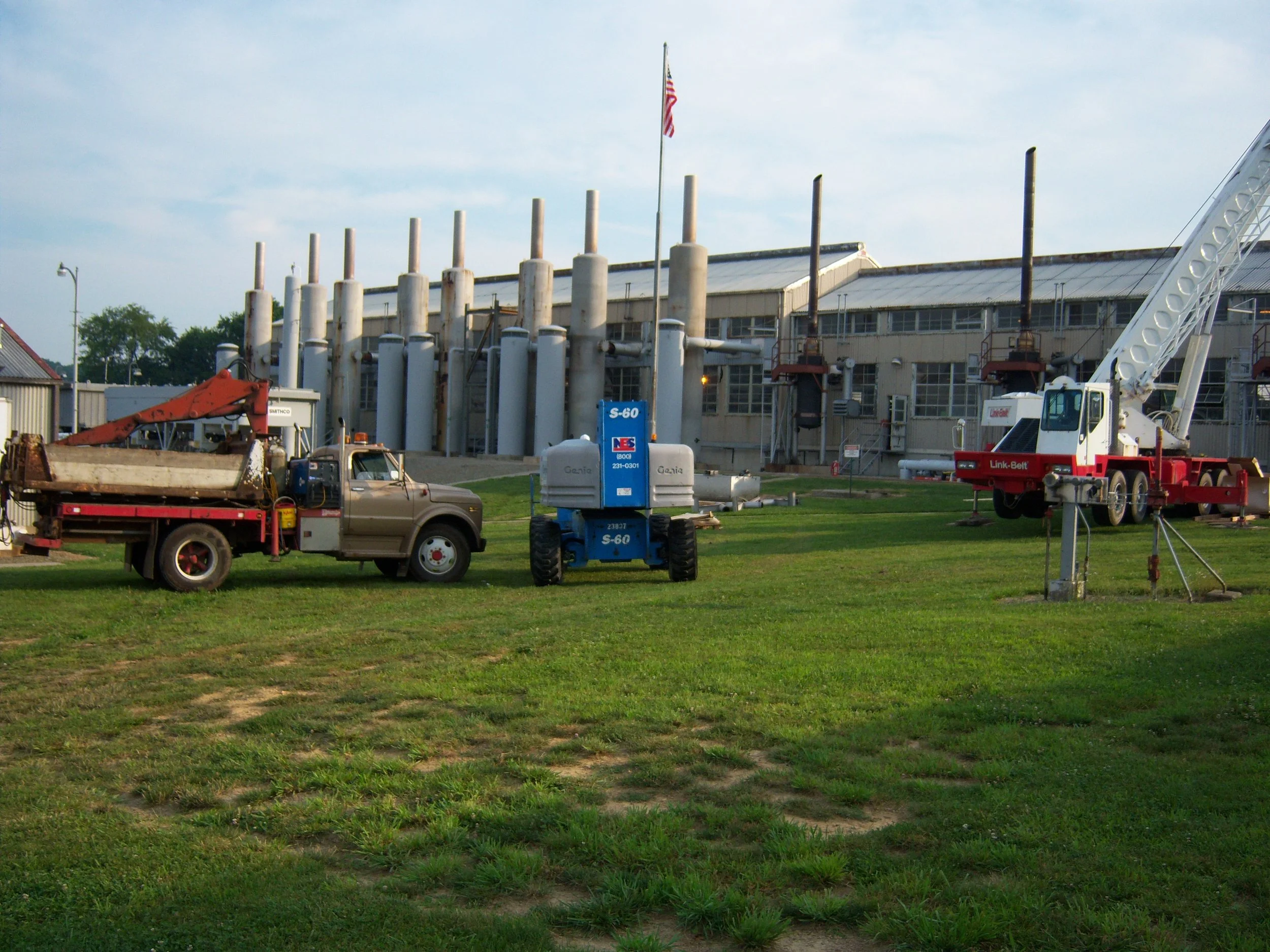 R.P.W. Contracting industrial welding and equipment rigging at manufacturing facility in Jeannette, PA with crane and boom truck onsite