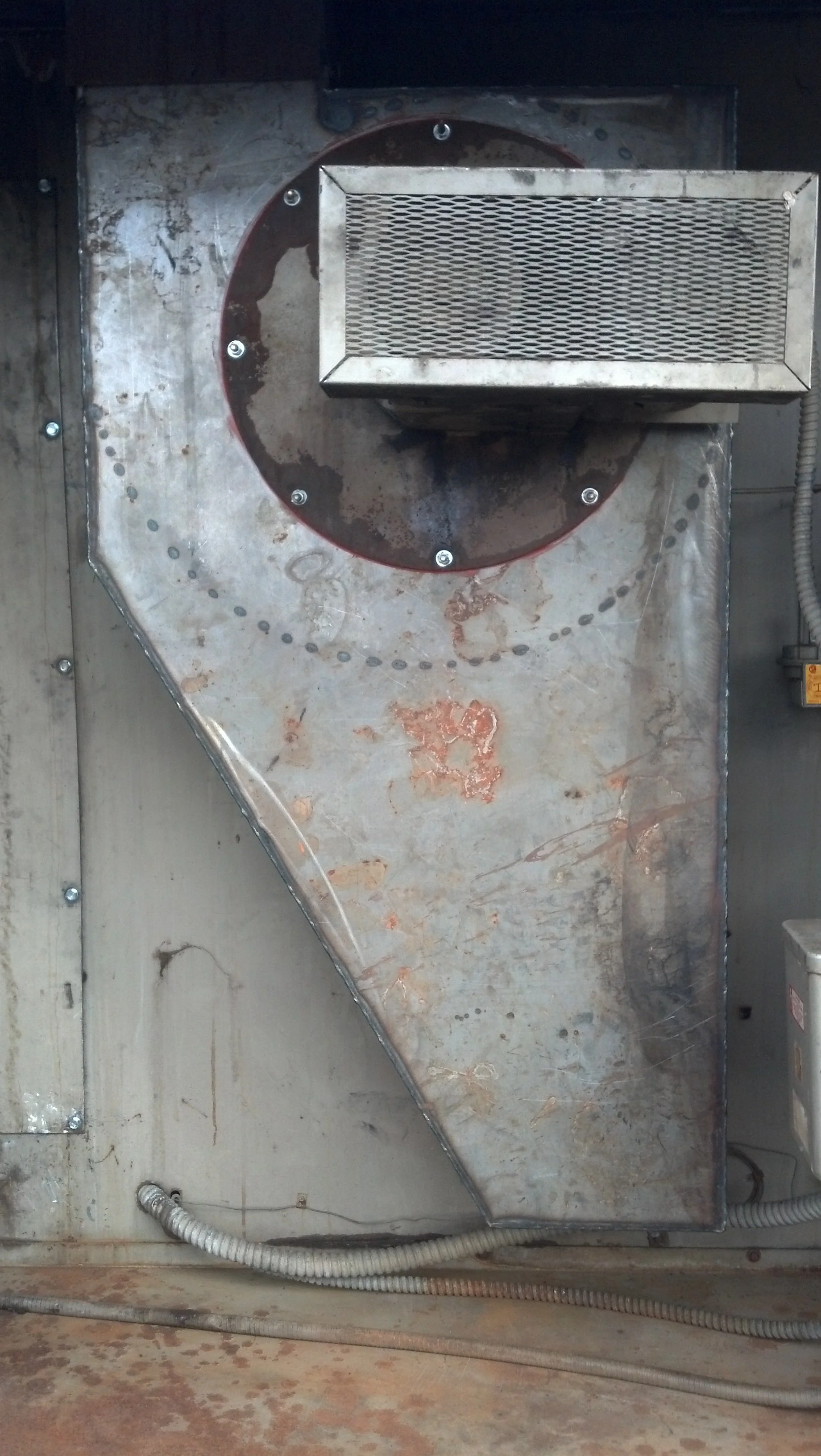 Custom metal blower housing installed on heavy equipment furnace – industrial repair service by R.P.W. Contracting in Jeannette, PA