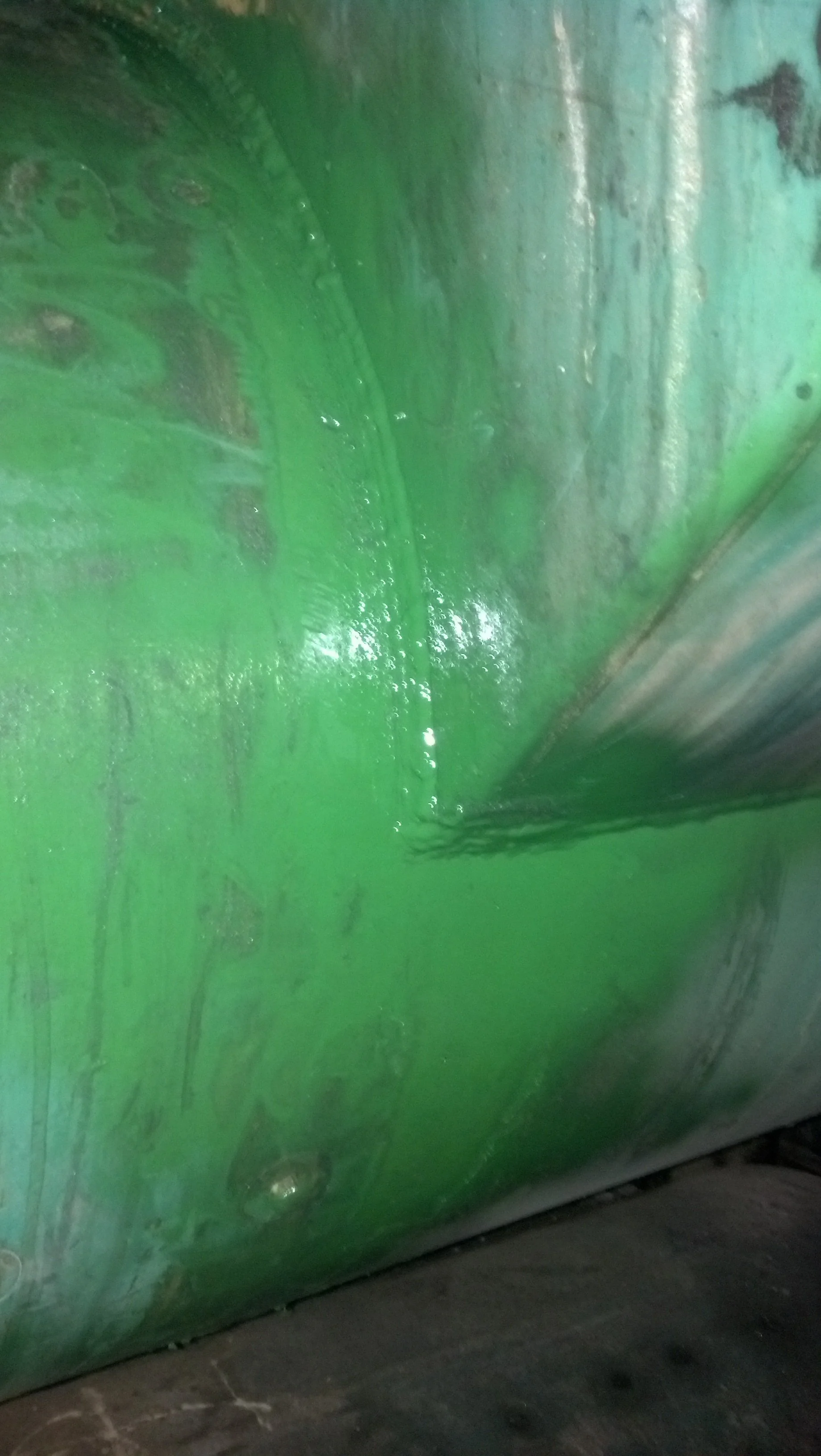 Completed emergency weld repair on green-painted industrial machine by R.P.W. Contracting in Jeannette, PA
