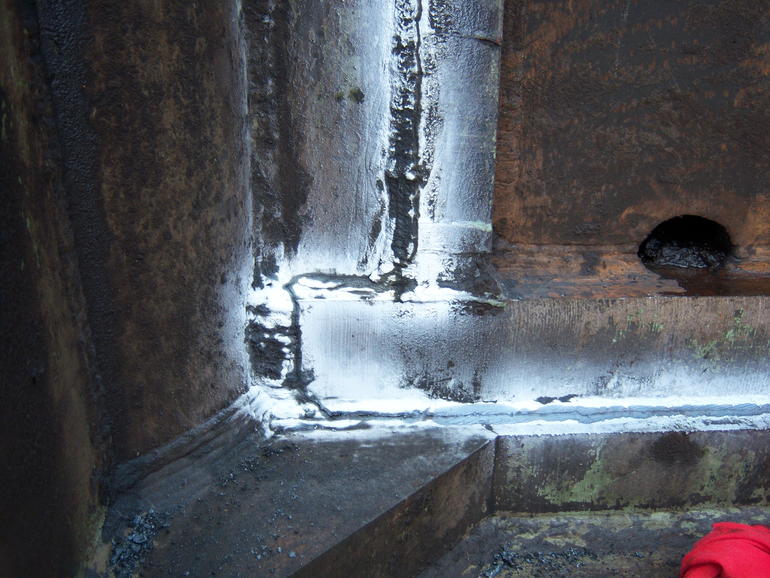 Crack detection dye test on 880-ton industrial shear prior to mobile welding repair by R.P.W. Contracting in Jeannette, PA
