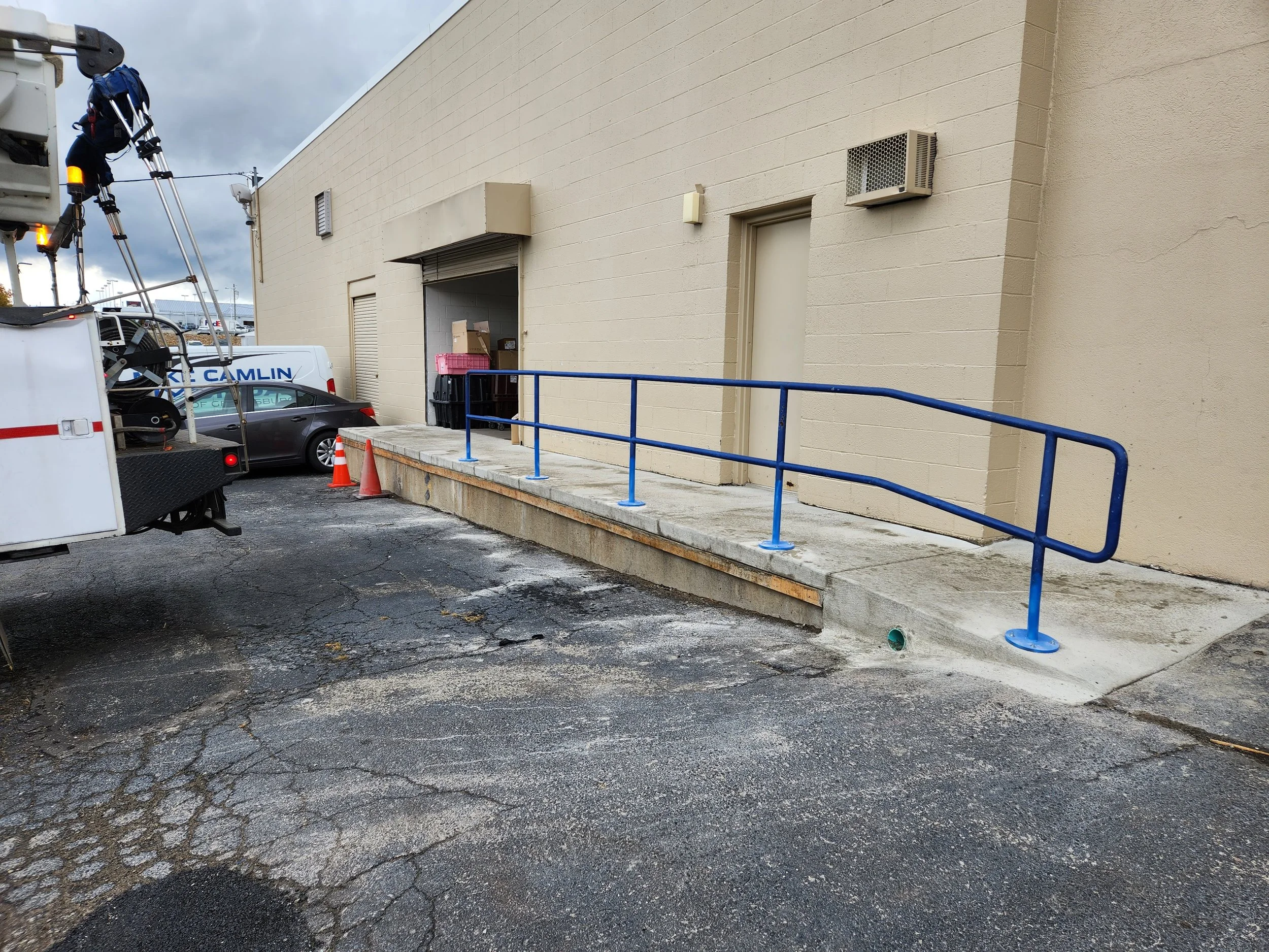 RPW Contracting installed a custom blue steel safety handrail on a commercial loading dock in Jeannette, PA