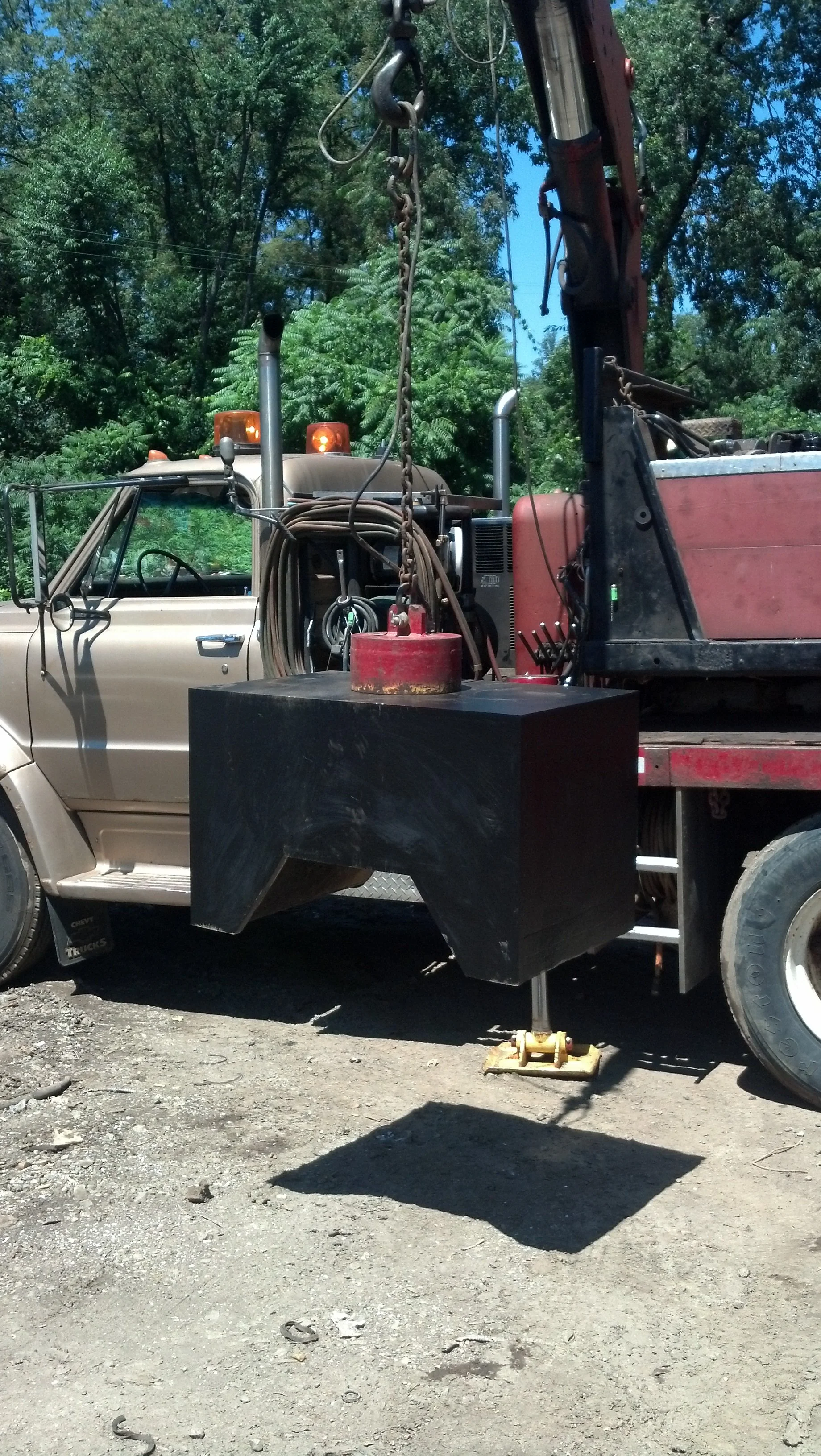 RPW Contracting lifting heavy equipment weldment for pickup and delivery in Jeannette, PA — mobile crane service and field-welded component transport