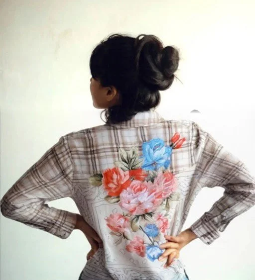 A delightfully perfect combination of plaid and floral in this stand-out shirt by Aratta