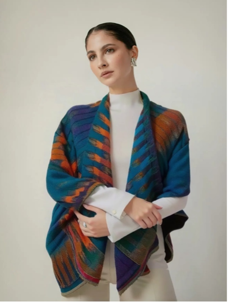 Subtle artistry in this wool and cotton handwoven shawl by the textile artisans of Samaya Co.  What’s not to love about pockets inside and out!