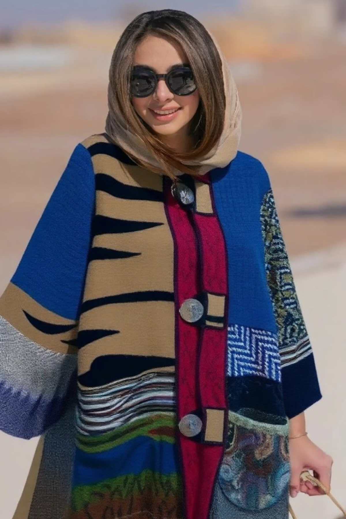 Make a memorable fashion statement wherever you go in this colorful, cozy coat by Ali Miles. 