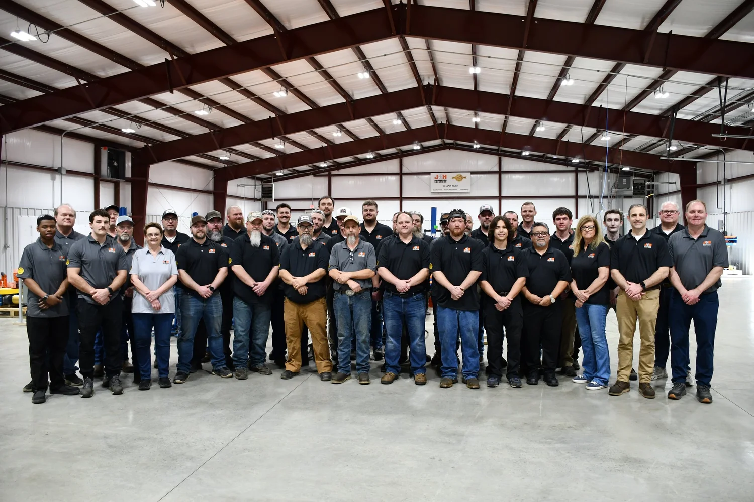 The J+H Automation Solutions engineering and fabrication team at the company's Hackett, Arkansas headquarters