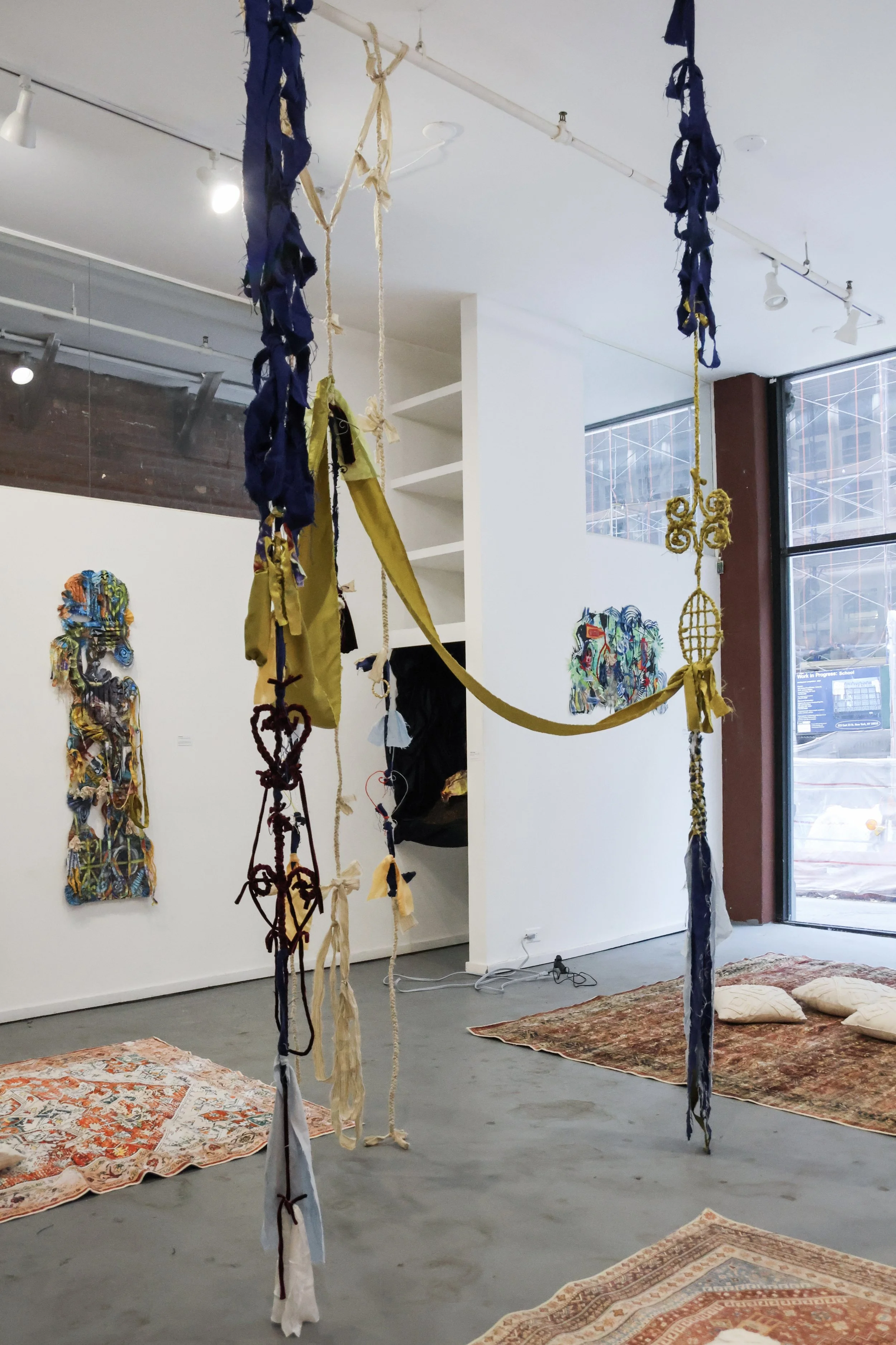 Climb: Rising from the Root | Installation | November 2025 | Fabric Scraps, Aluminum Wire, Embroidery Thread, Bamboo Door Knocker Earrings.
