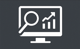 Magnifying glass and arrow pointing upward on a computer monitor, symbolizing data analysis or growth.