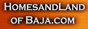 Text that reads 'HOMES AND LAND OF BAJA.COM' on a wooden background