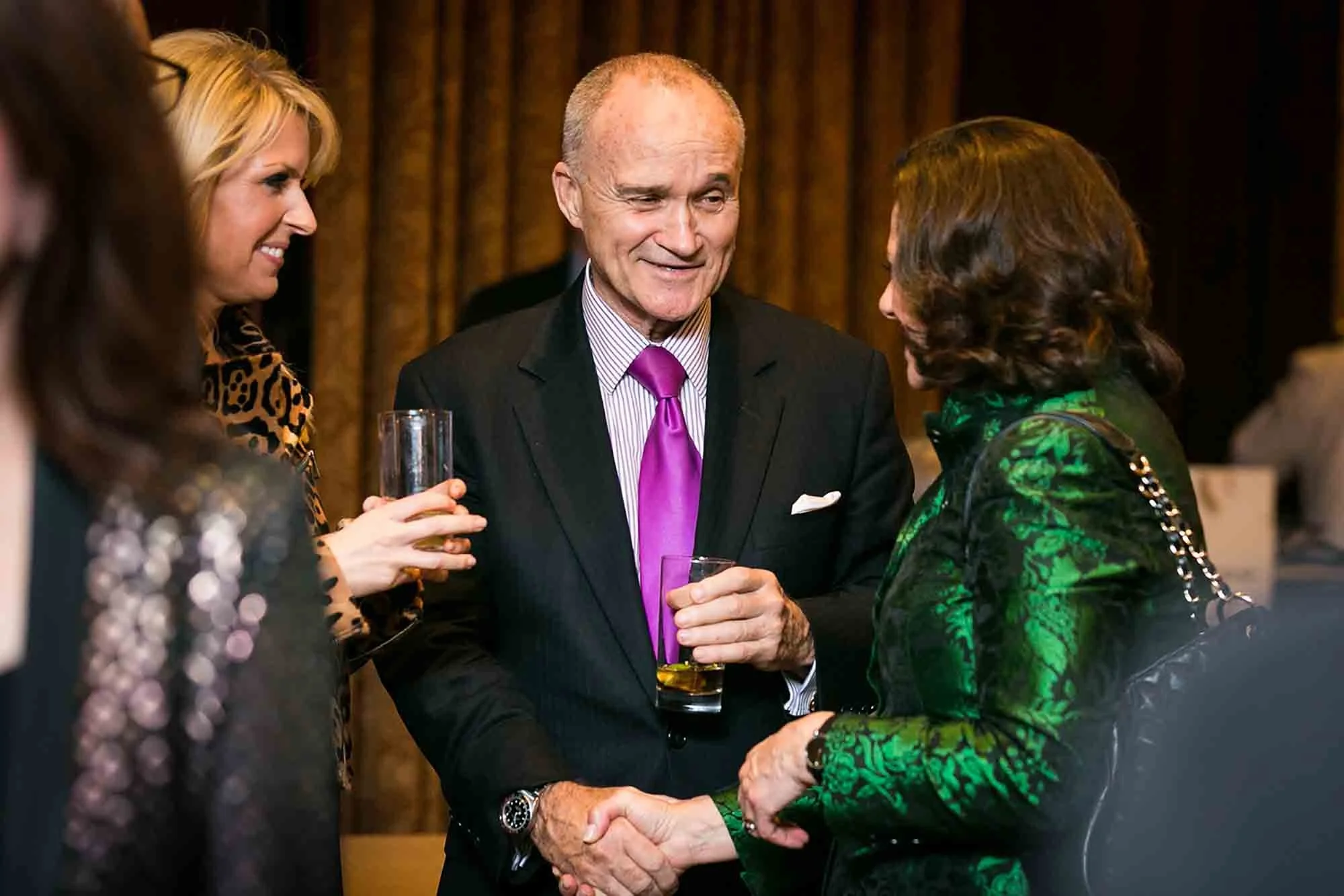 Former NYPD Police Commissioner, Ray Kelly, shaking hands at an event by San Antonio corporate event photographer, Kelly Williams