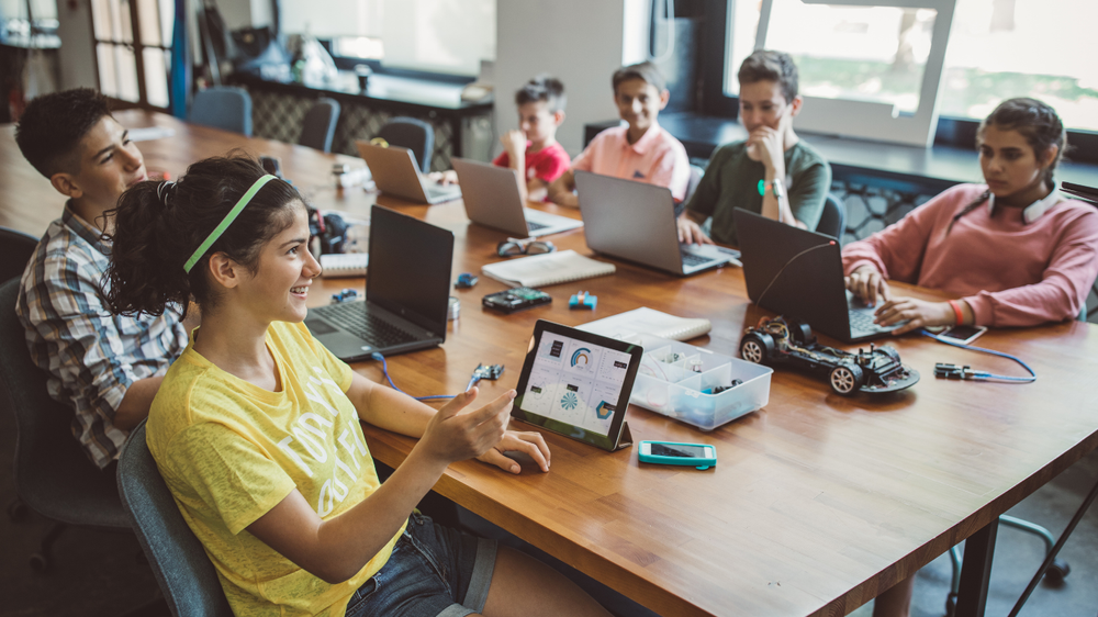 Students taking part in an American Robotics Academy summer robotics activity.