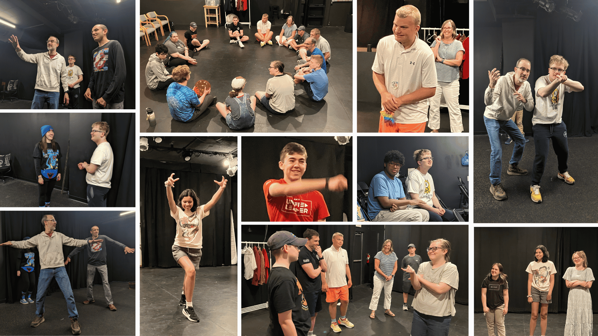 Group of people participating in different activities on a black theater stage with black curtains. Some are sitting in a circle, others are standing and gesturing, and a few are posing or smiling for the camera. The setting appears to be a theater or workshop space.