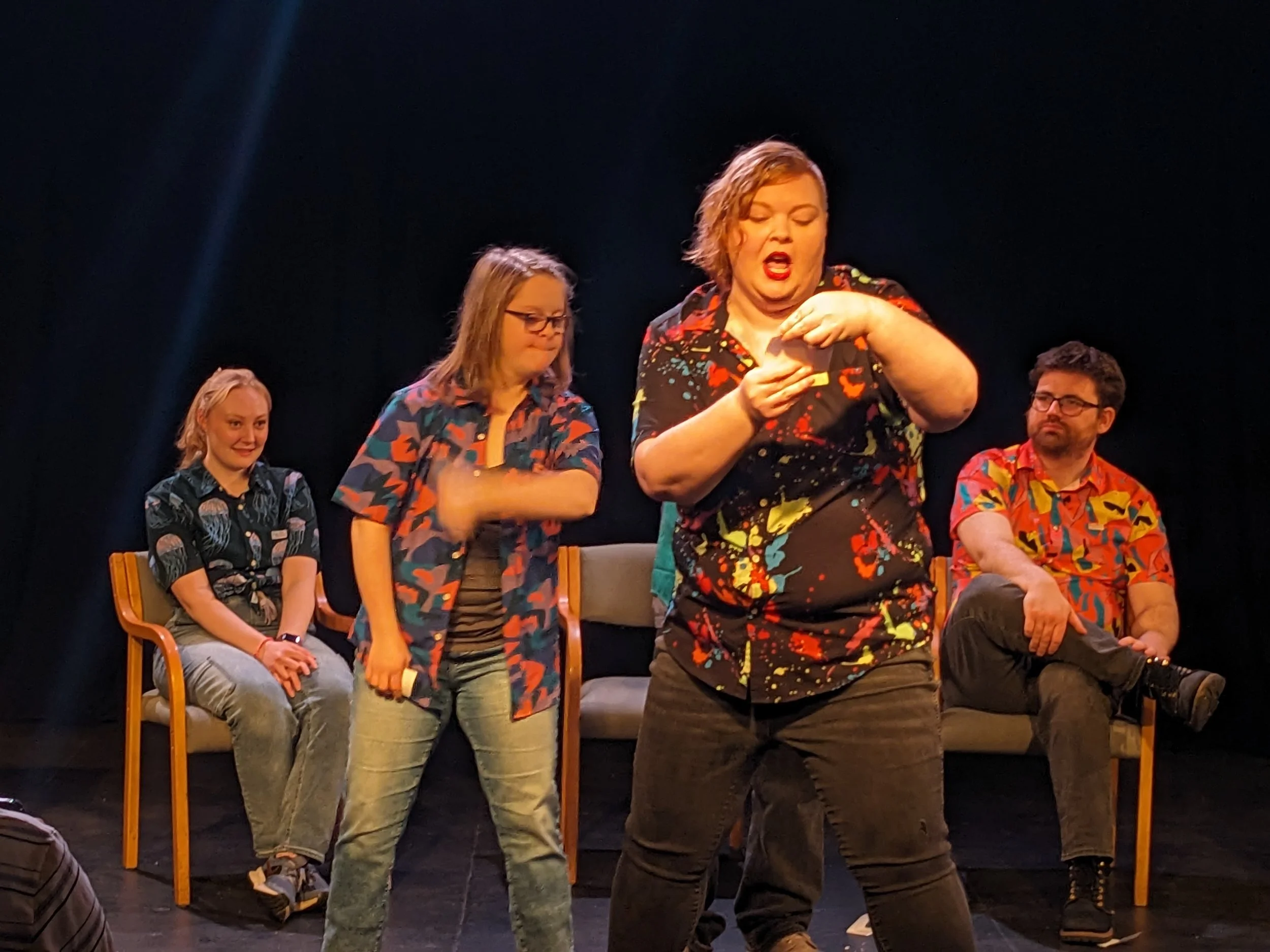 MNprov Live! cast members perform a scene