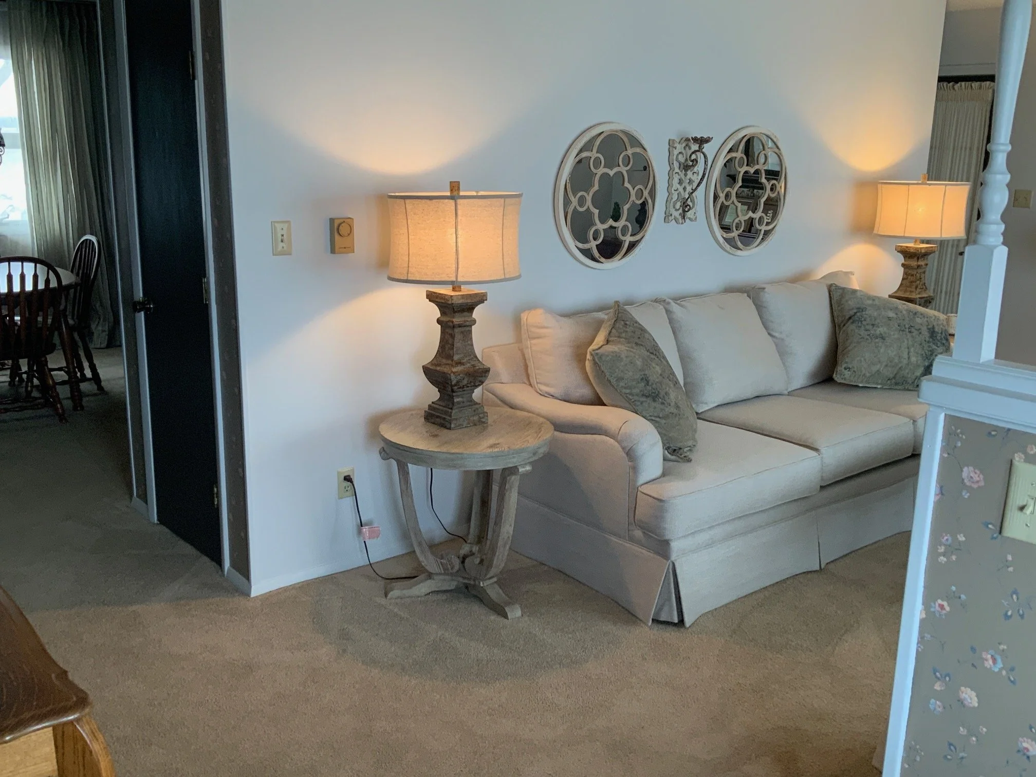 Living room with dining room in background