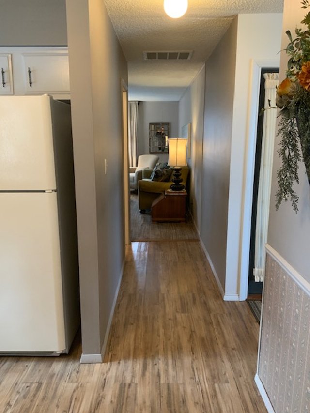 Hall to first bathroom and family room