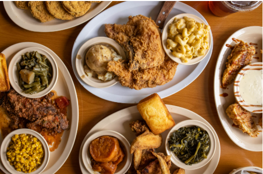 Come enjoy several takeout containers filled with a variety of Southern comfort foods.