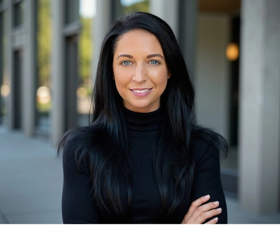 Handwritten grief support letter on a wooden table with dried flowers