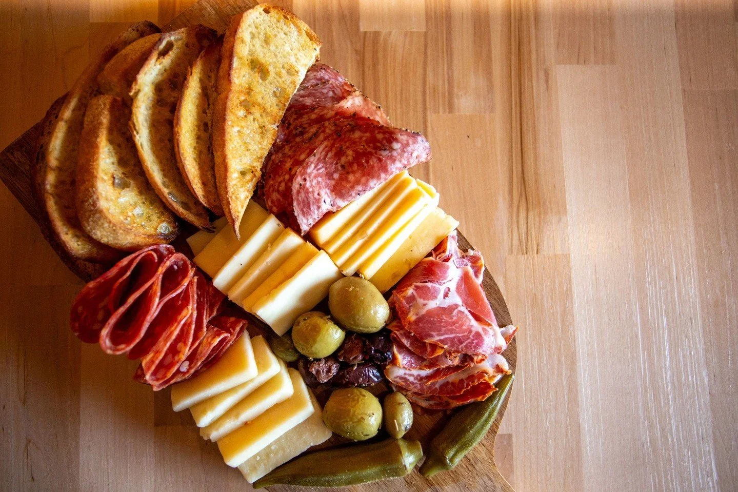 Wine, cheese, and great company. Our charcuterie boards pair perfectly with your favorite bottle.