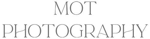The text 'MOT PHOTOGRAPHY' in gray on a black background.
