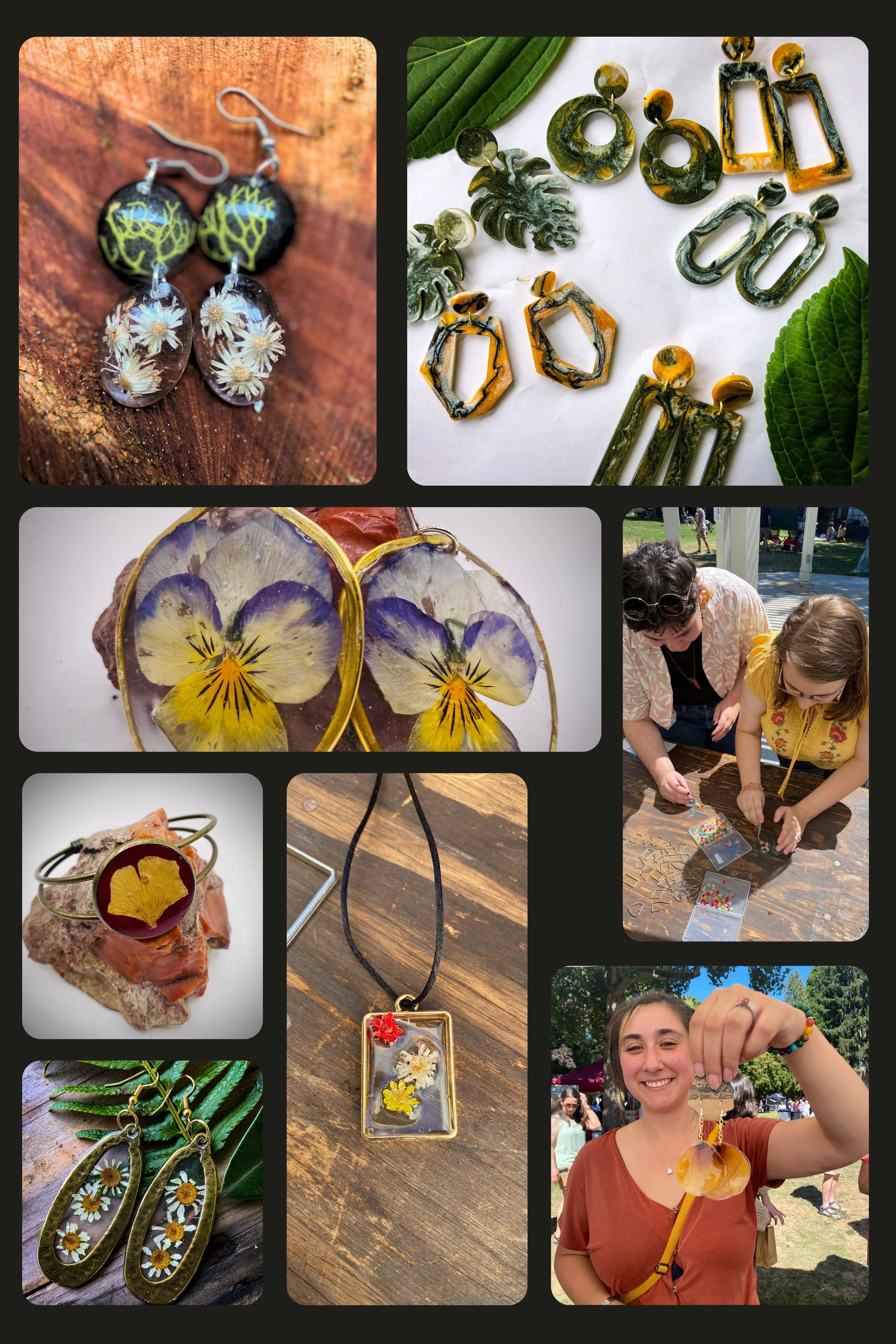 Assorted handmade jewelry including earrings, necklaces, and bracelets with floral and nature-inspired designs, displayed on various surfaces and worn by woman and children at an outdoor market.
