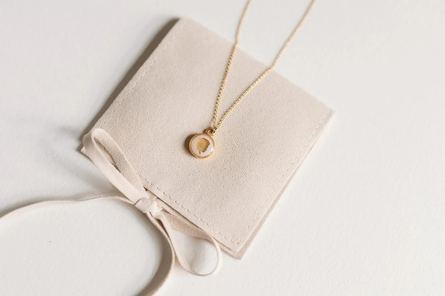 Every jewelry piece comes in a soft sand-colored pouch, ready to be shared and cherished.

#heirloomjewelry #silhouettejewelry #silhouettenecklace #silhouette #childsilhouette #silhouetteportrait #meaningfulgifts #handmadejewelry #jewelrypackaging #h