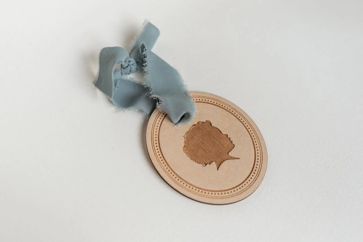 Our silhouette ornaments look beautiful on the tree, add a special touch to wrapped gifts, and make the sweetest stocking tags. Less than one week left to order for Christmas!

#silhouetteornament #heirloomkeepsake #holidaymemories #childhoodkeepsake