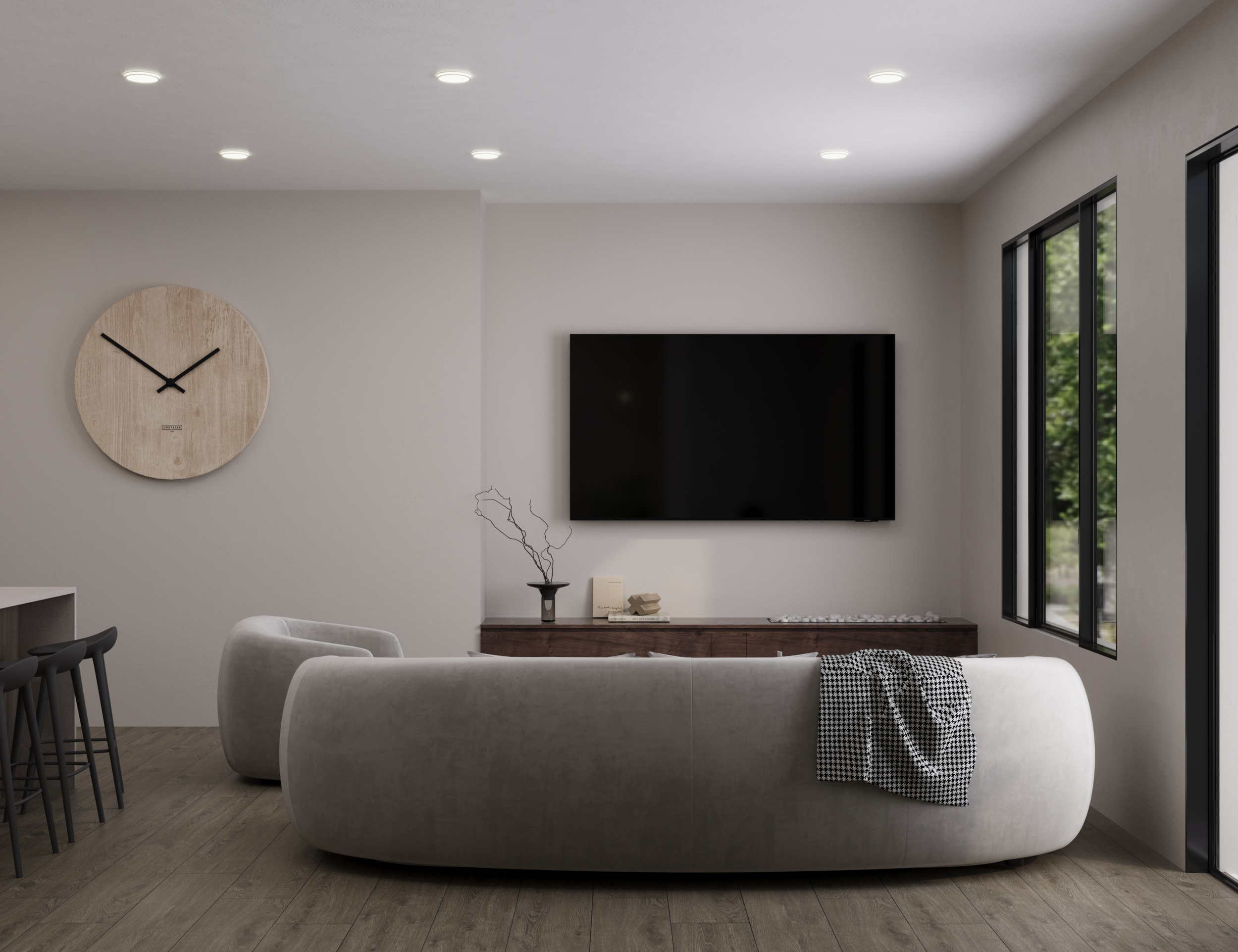 Interior Rendering of Serenity's modern living room with a beige curved sofa, a wall-mounted flat-screen TV, large windows with black frames, a wooden sideboard, a decorative clock on the wall, and minimalistic decor.