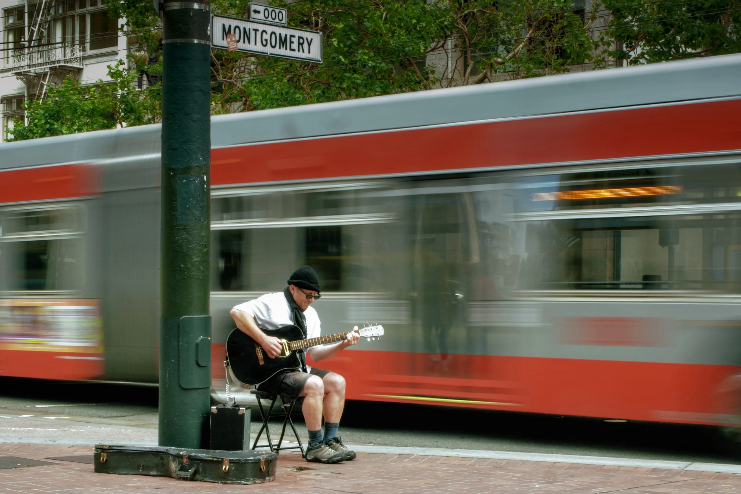  Guitar Man  Melody in the blur Market St, San Francisco, 2025  LUMIX G85  |  Prime  |  Digital 