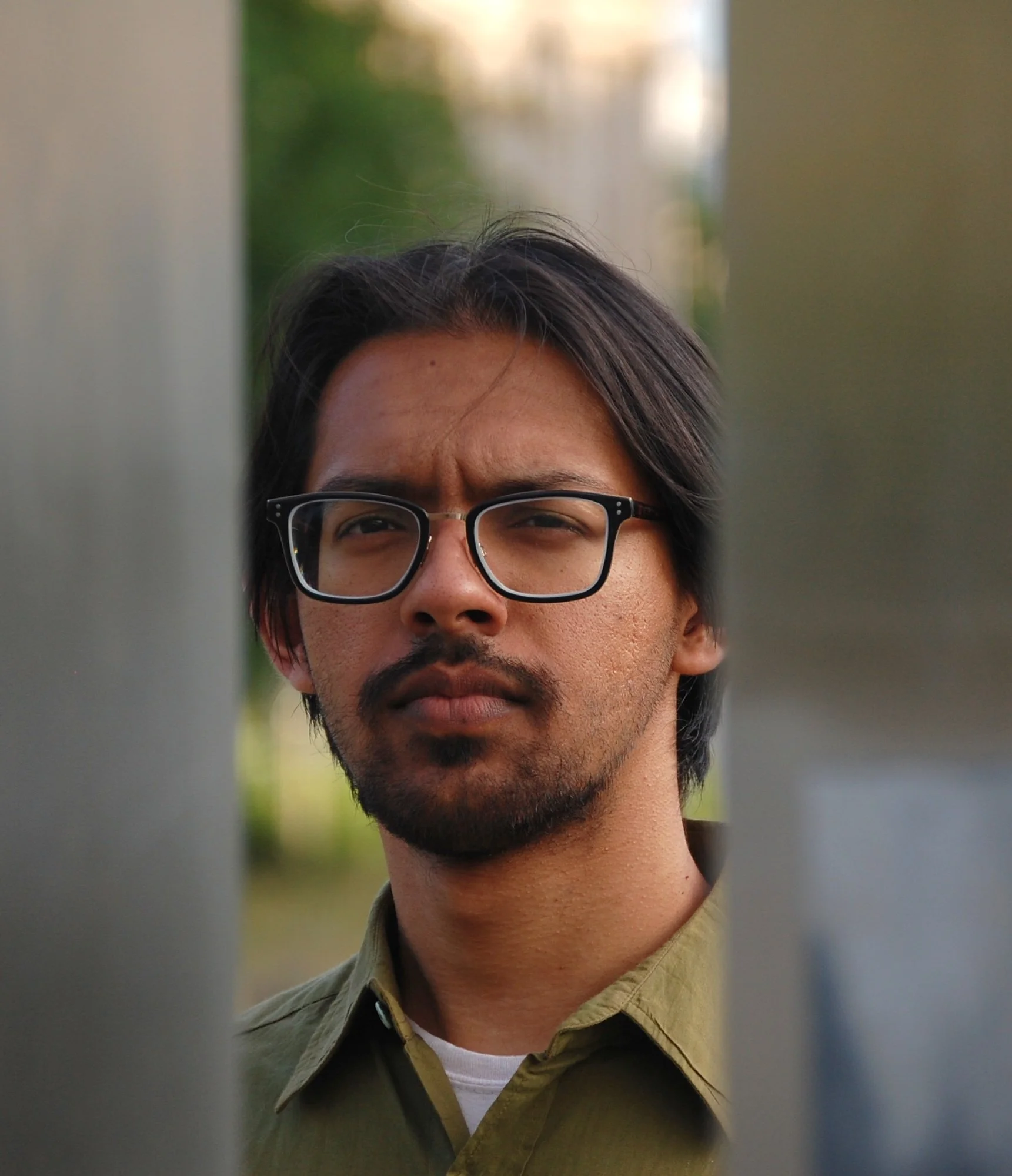 A portrait of Pico Banerjee, Proprietor, Peek-a-Book Rare Books & Ephemera.