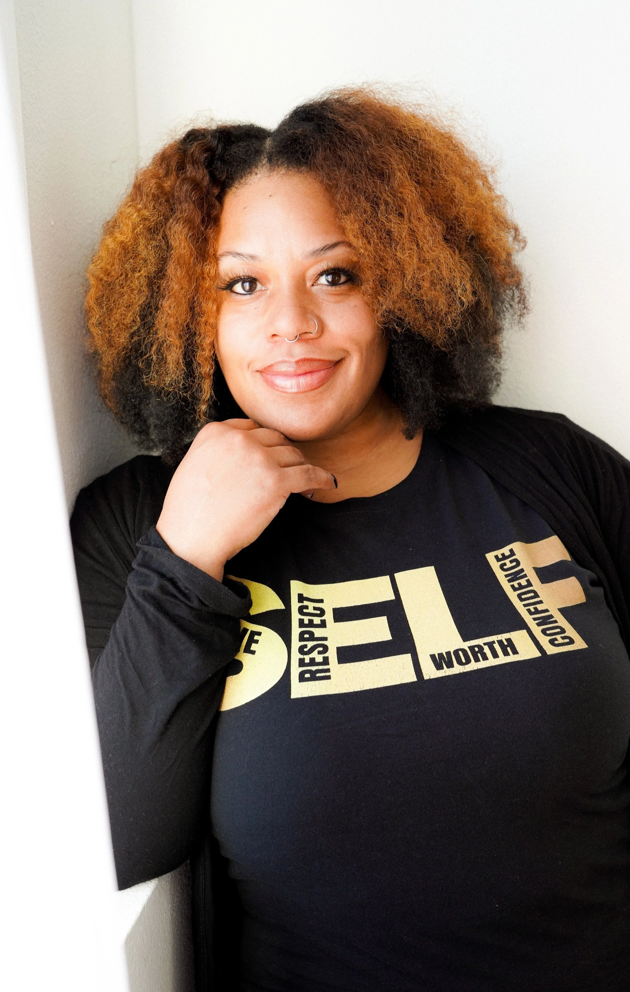 Woman with curly hair, Black woman, Black therapist, Black owned, trauma therapist, counseling