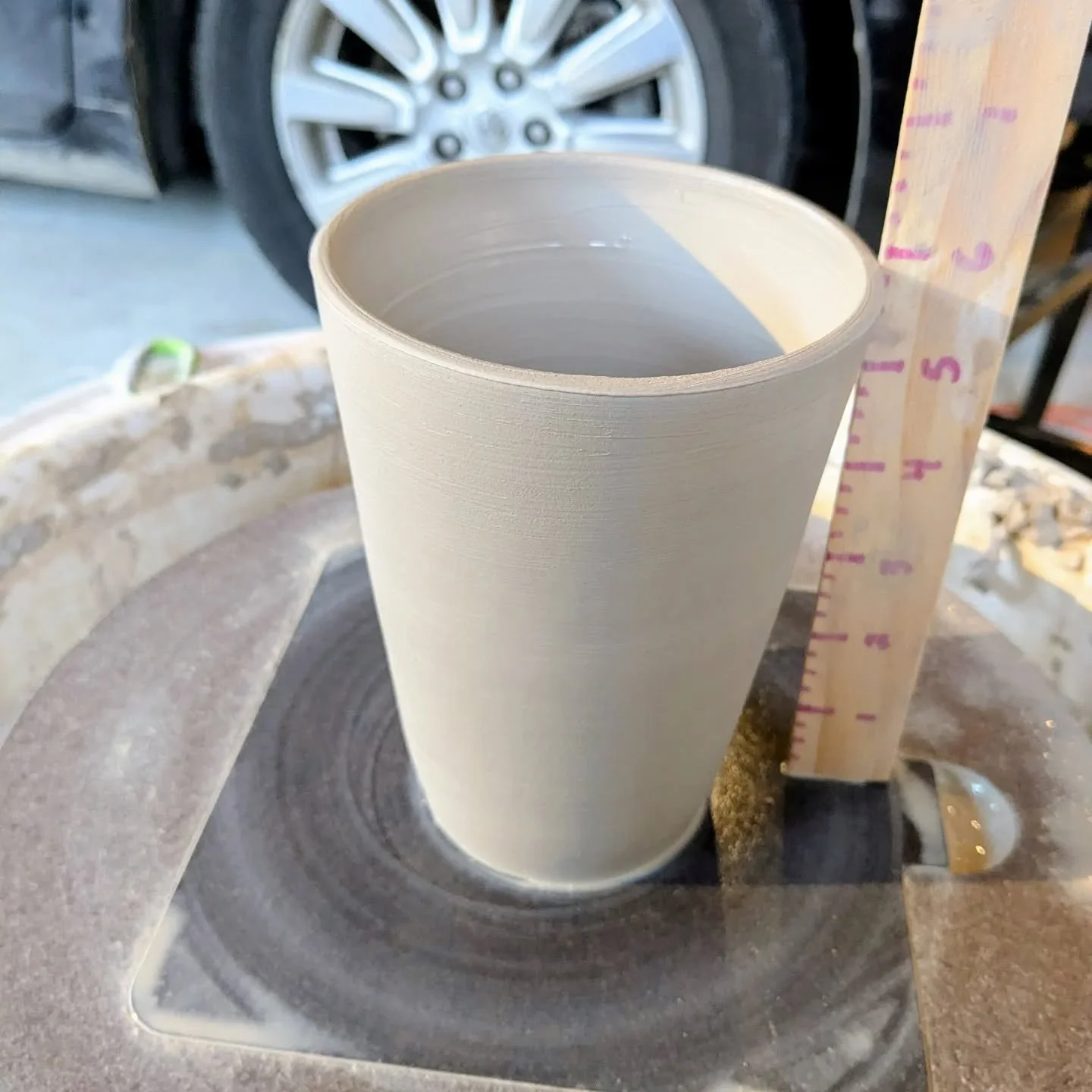 When your van leaks so your studio has to turn back into a garage every time it rains...one day we'll get it fixed, but until then, Black Beauty is keeping me company while I throw. Thankfully she's pretty quiet. 

#potterystudio #potterythrowing