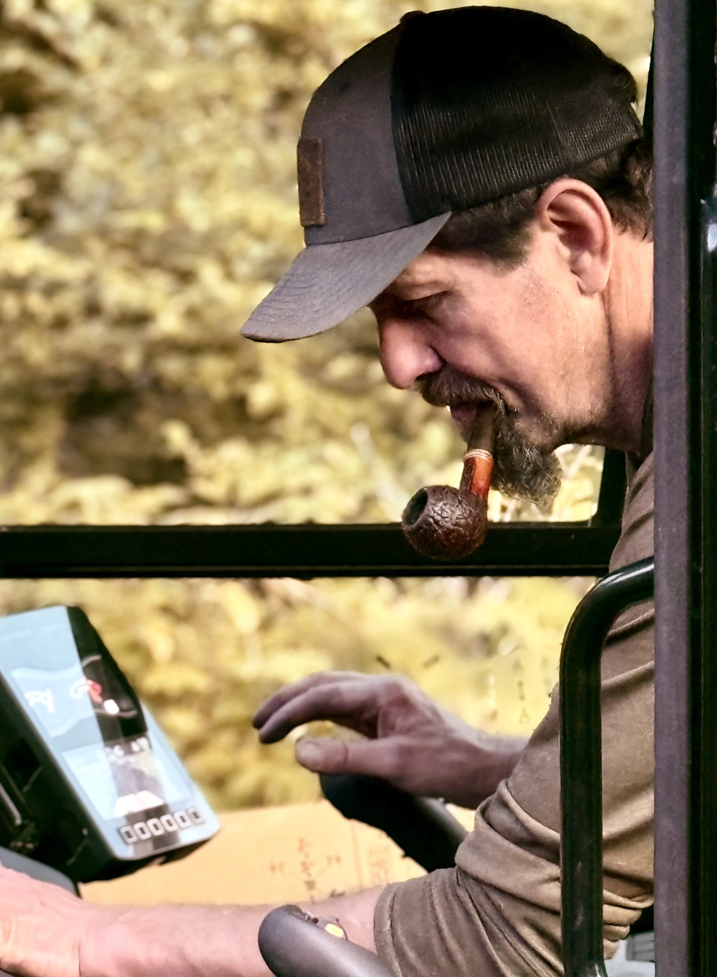 Jeff hard at work in the mini excavator.
