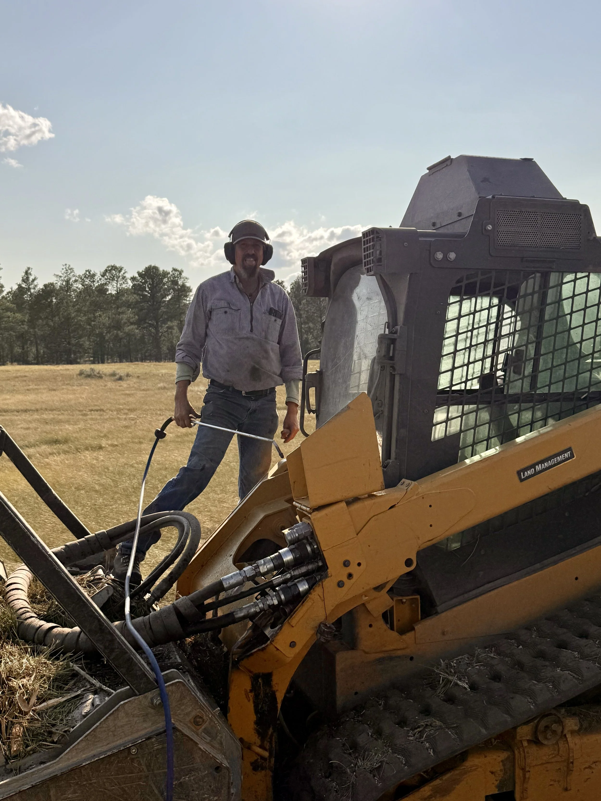 It's a dusty job. Here Jeff is blowing out the machine at the end of the work day.