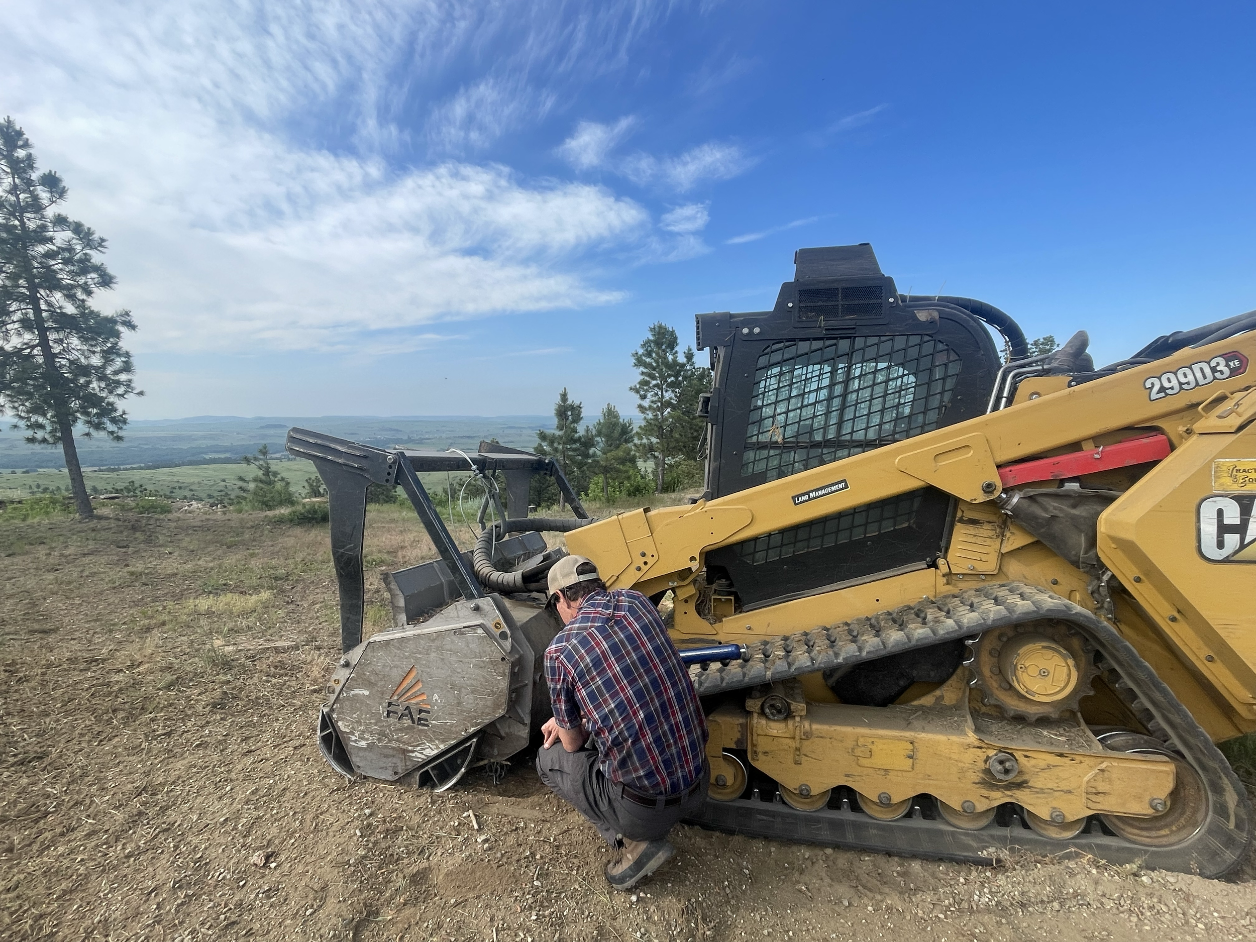 We work in remote areas and our equipment must be maintained. Here Jeff is working on our Skid steer. Any mechanic work that can be done on site is done by Jeff or one of his sons in an effort to limit down time for us and for our customers.