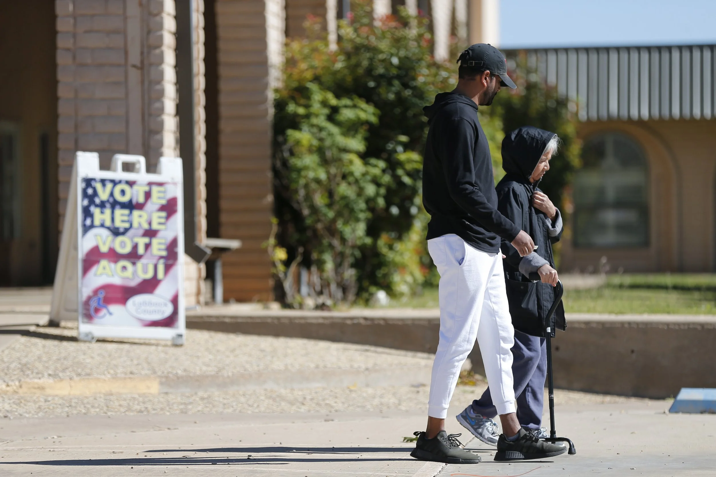 Voters are seen leaving the Catholic Diocese of Lubbock polling site on Election Day, Nov. 5, 2024, in Lubbock.