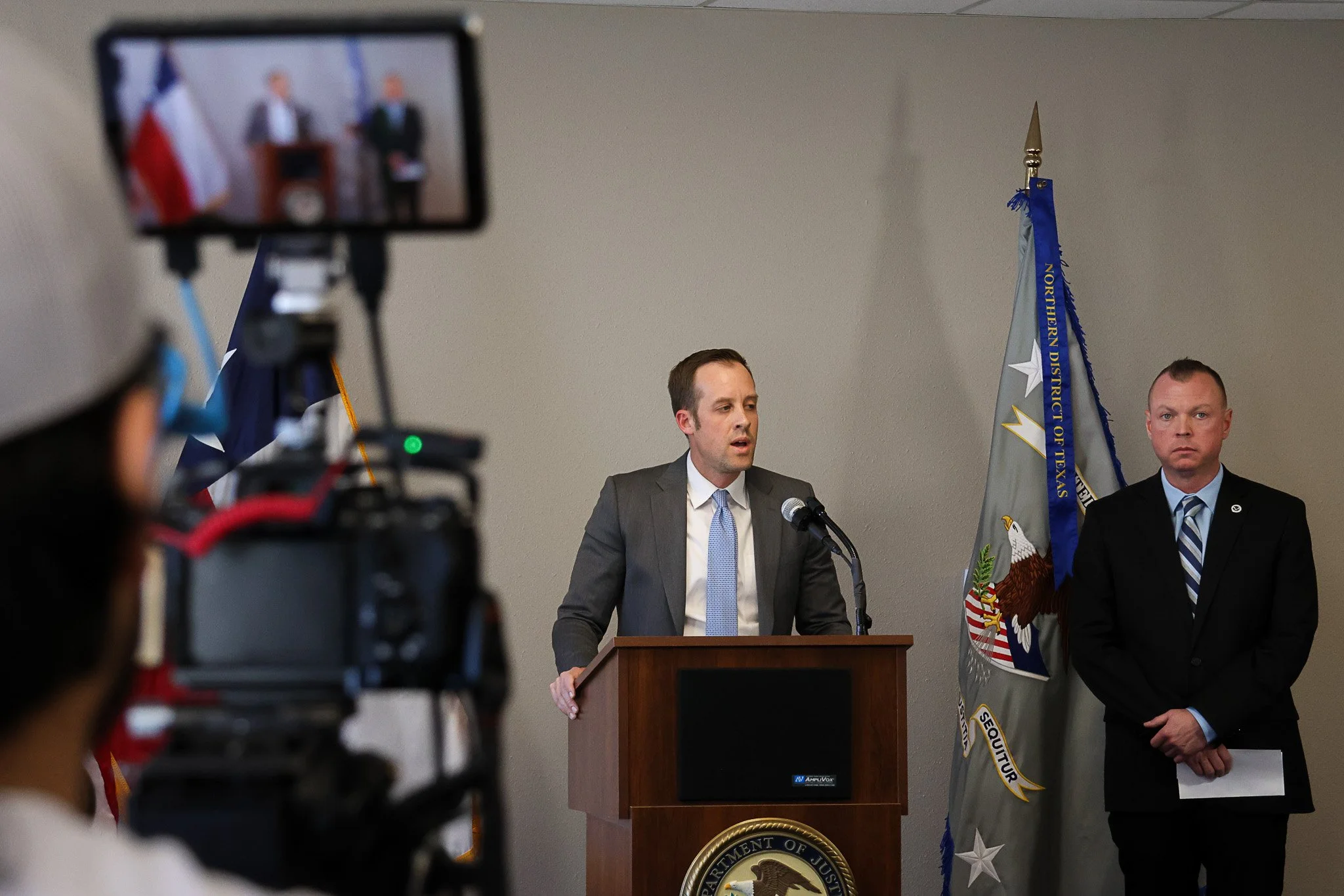 Ryan Raybould, U.S. Attorney for the Northern District of Texas, speaks to local media on Feb. 11, 2026 detailing the federal indictment of Rassian Nateray Comer in a fatal 2023 West Texas crash in Lubbock, Texas. Comer is accused of killing a seven-