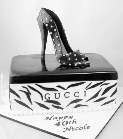 Shoe Box and Stiletto - Have that someone special in your life who is obsessed with their shoes? This stunning cake can be created with any brand with any style of shoe and shoe box.