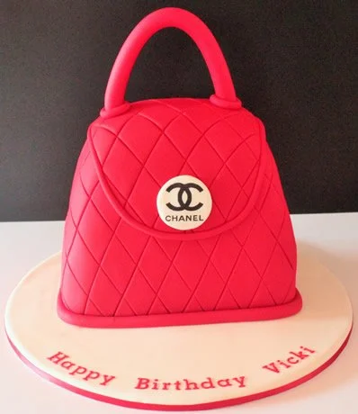 3D Handbag Cake - Who doesn’t love something designer??? Why not treat that someone special to a designer handbag cake!