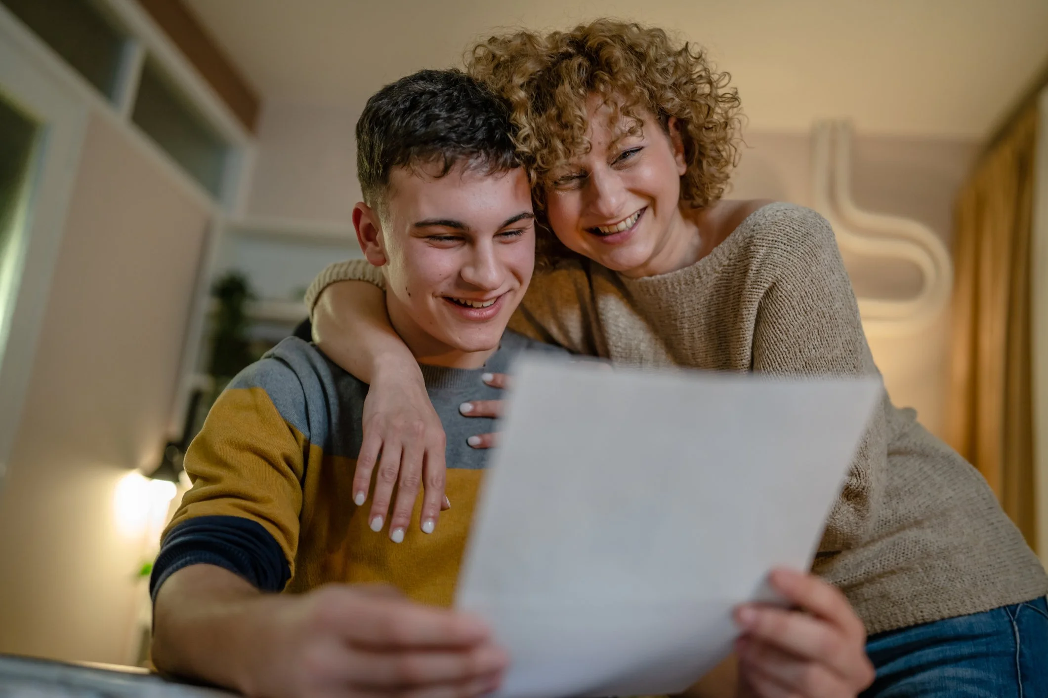 Parent and teen reviewing progress together for speech therapy, language therapy, reading help, spelling support, and social skills services in Haddonfield, NJ